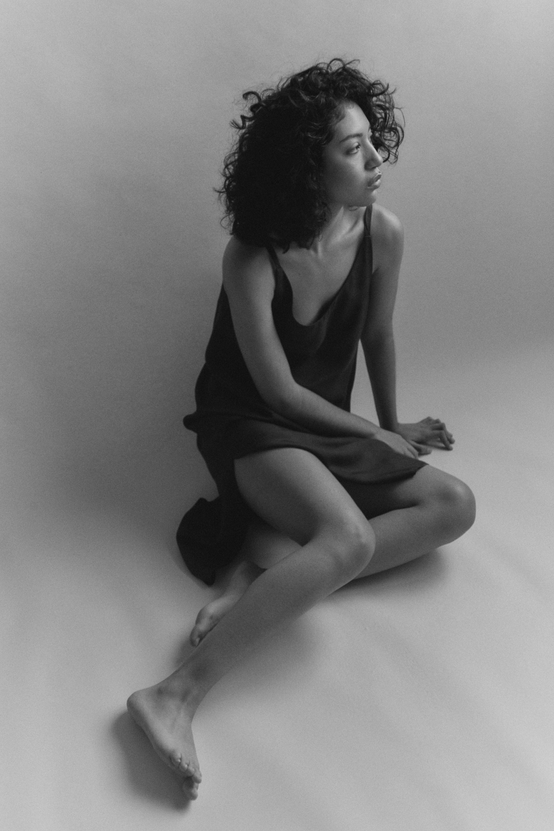 Model in eucalyptus slip dress - botanical print styling