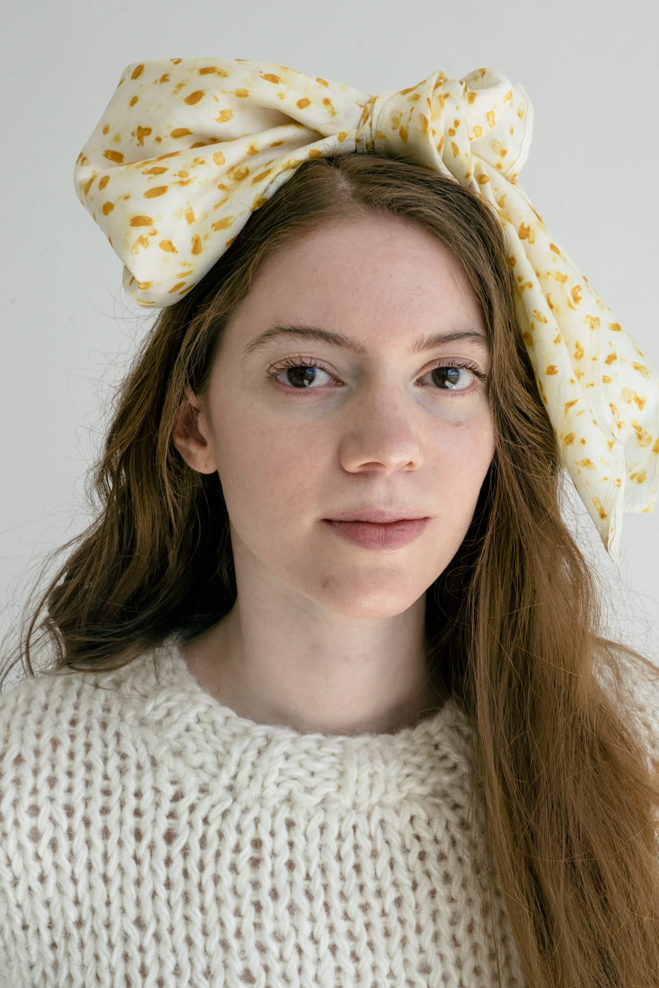 OUND accessories — hand-dyed silk scarves, handcrafted bags and jewelry in natural materials.