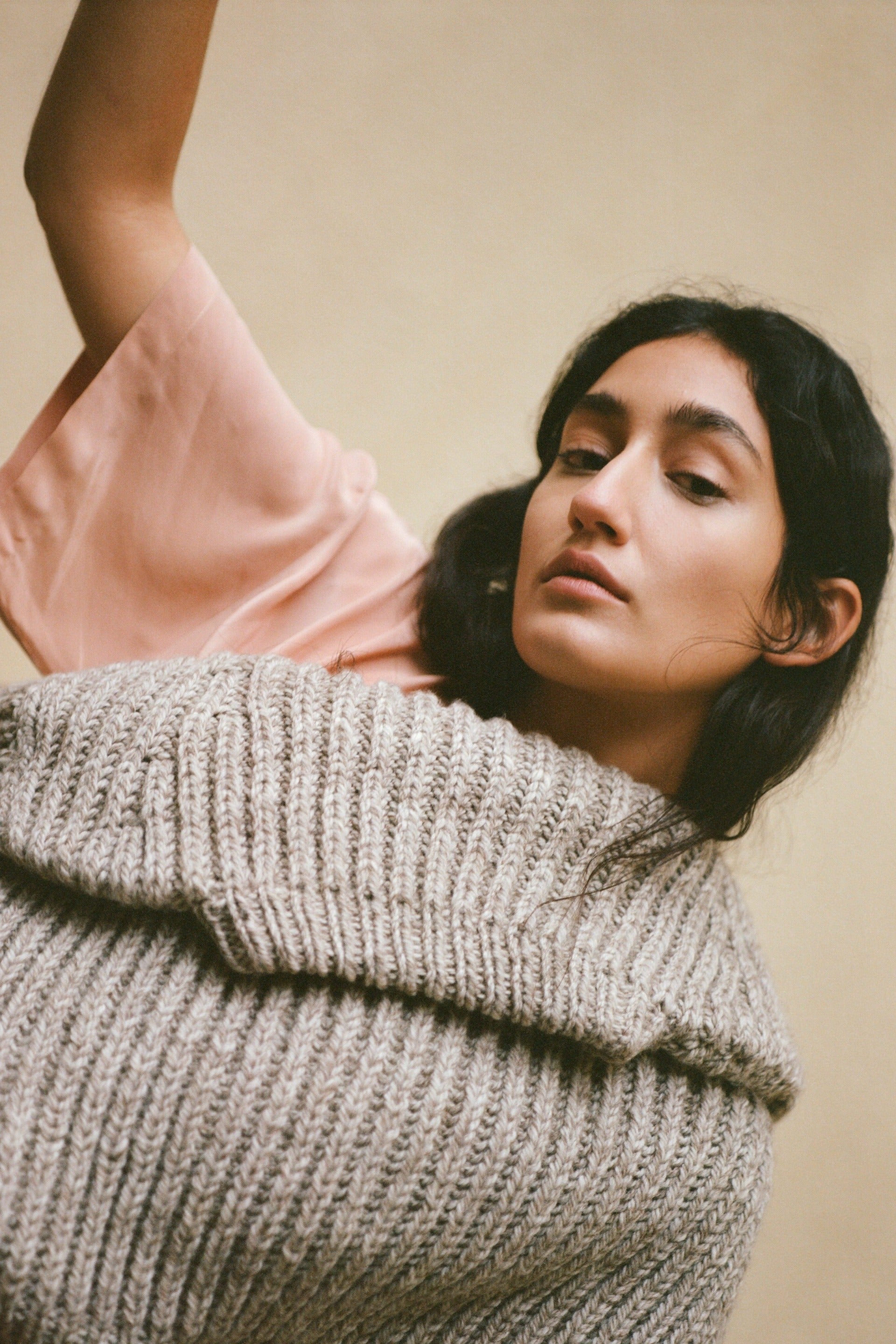 Model wearing avocado T top - relaxed fit styling