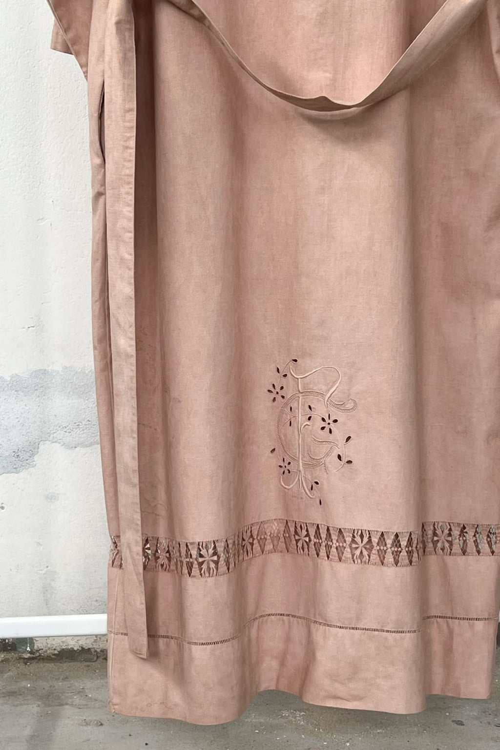 Hand embroided vintage textile, turned into a contemporary garment. Antique fabric hand dyed with avocado, resulting in a summery pink. 
