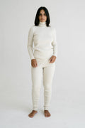 Pato Roller Neck in soft ivory — hand-knitted merino wool.
