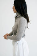 Pato Roller Neck in Taupe — hand-knitted merino wool.