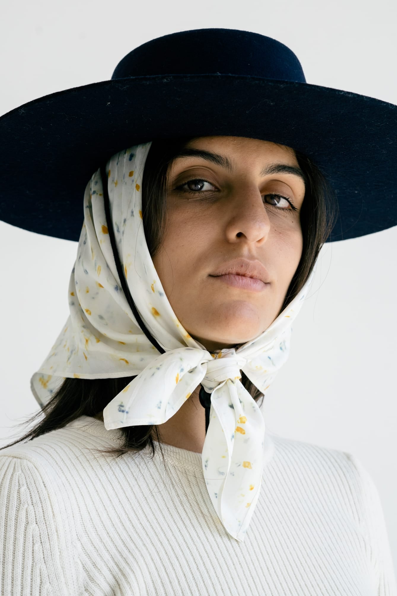 Truco Crew Neck in soft ivory — hand-knitted merino wool, alternate view.