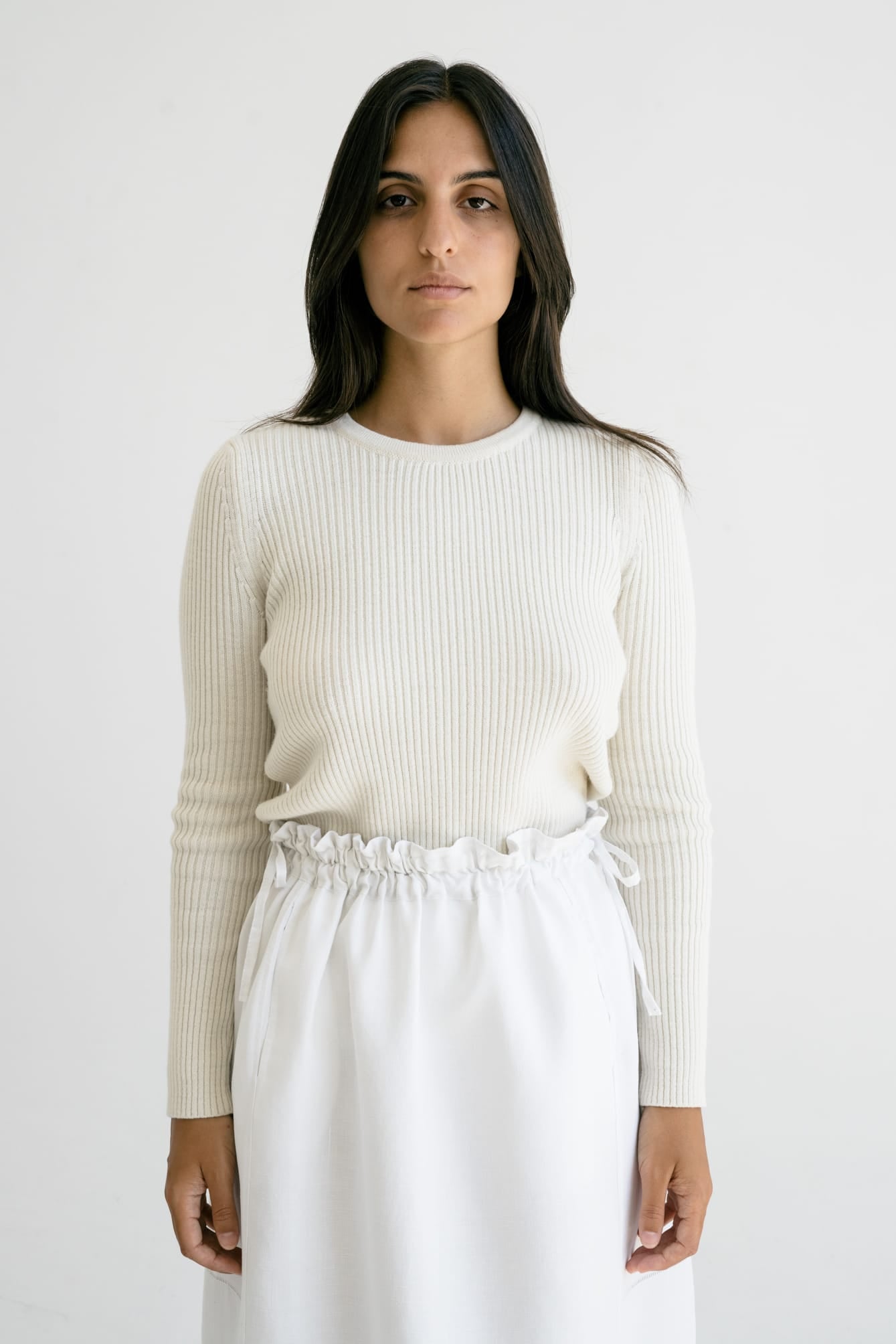 Truco Crew Neck detail — hand-knitted merino wool texture up close.