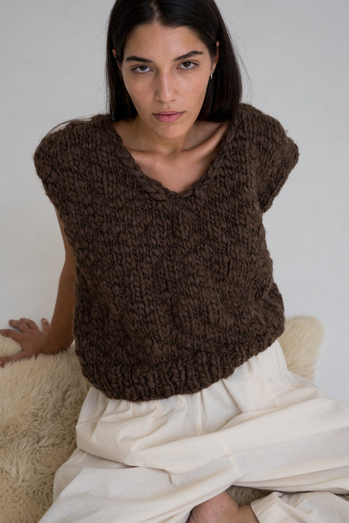 Acacia Vest in earth brown — hand-knitted wool.