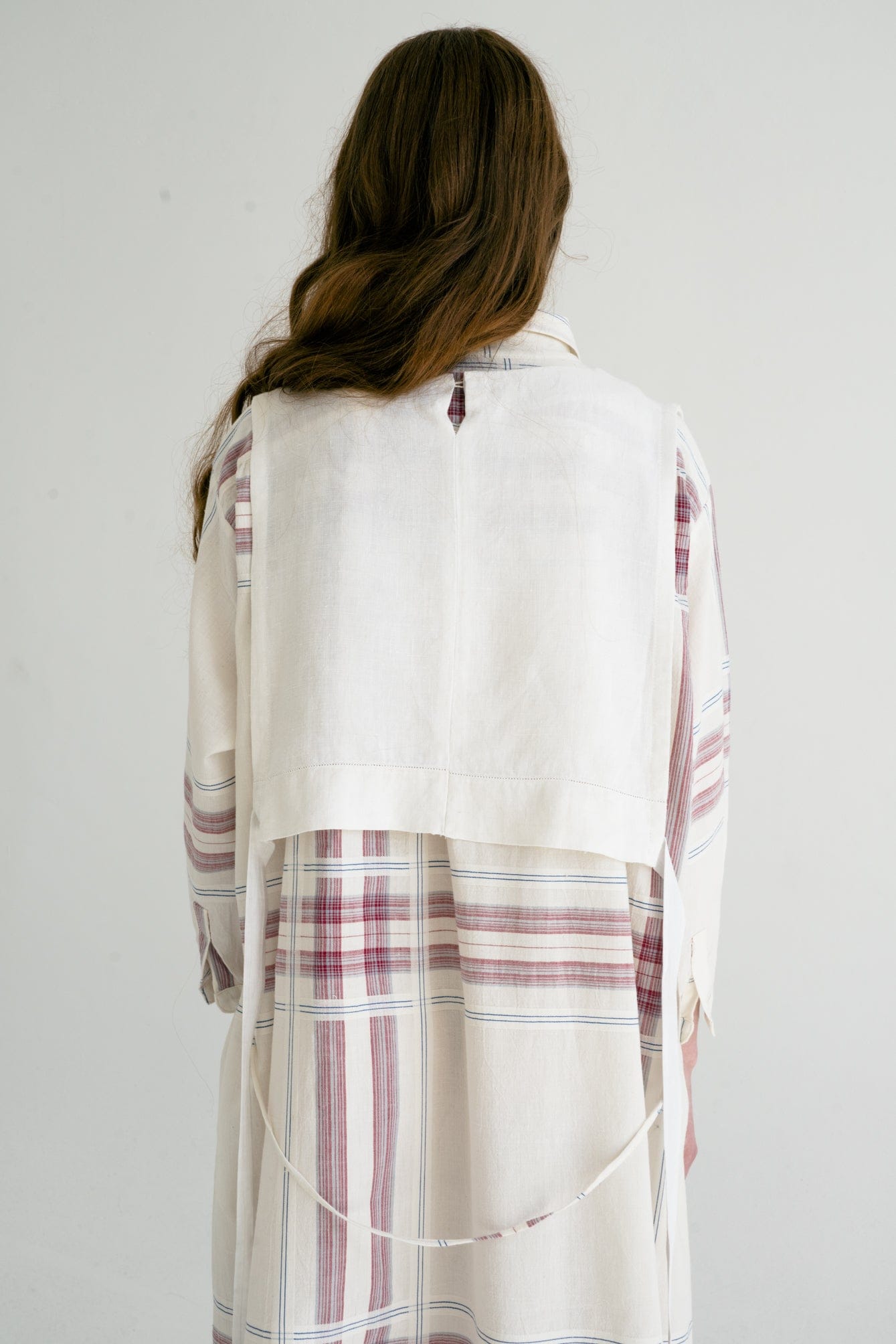 Model wearing Aromita Slipover Top in natural undyed tone — relaxed slow-fashion styling.