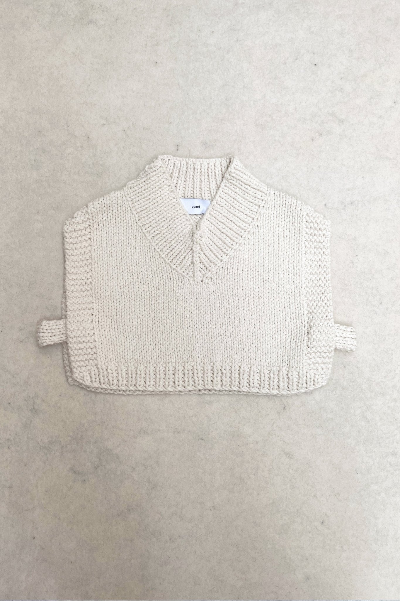 Bunon Vest in soft ivory — hand-knitted merino wool, alternate view.