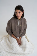 Caoba Cardigan in warm brown — hand-knitted merino wool.
