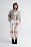 Caoba Cardigan in soft stone grey — hand-knitted merino wool.