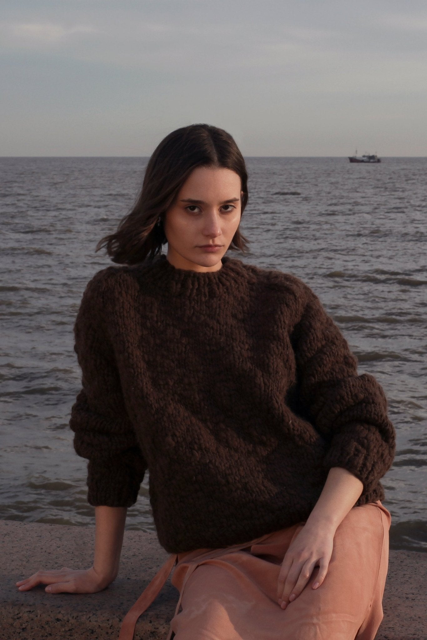 Caven Jumper in earth brown — hand-knitted wool.