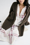 Cedro Cardigan in earth brown — hand-knitted wool.