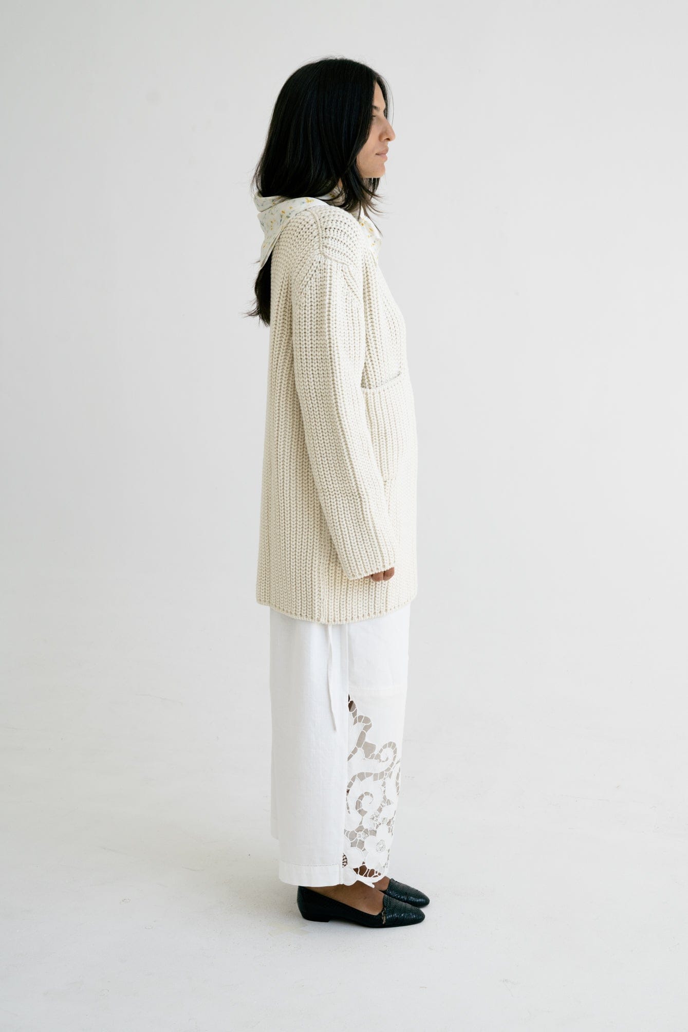 Cedro Cardigan in soft ivory — hand-knitted merino wool, alternate view.