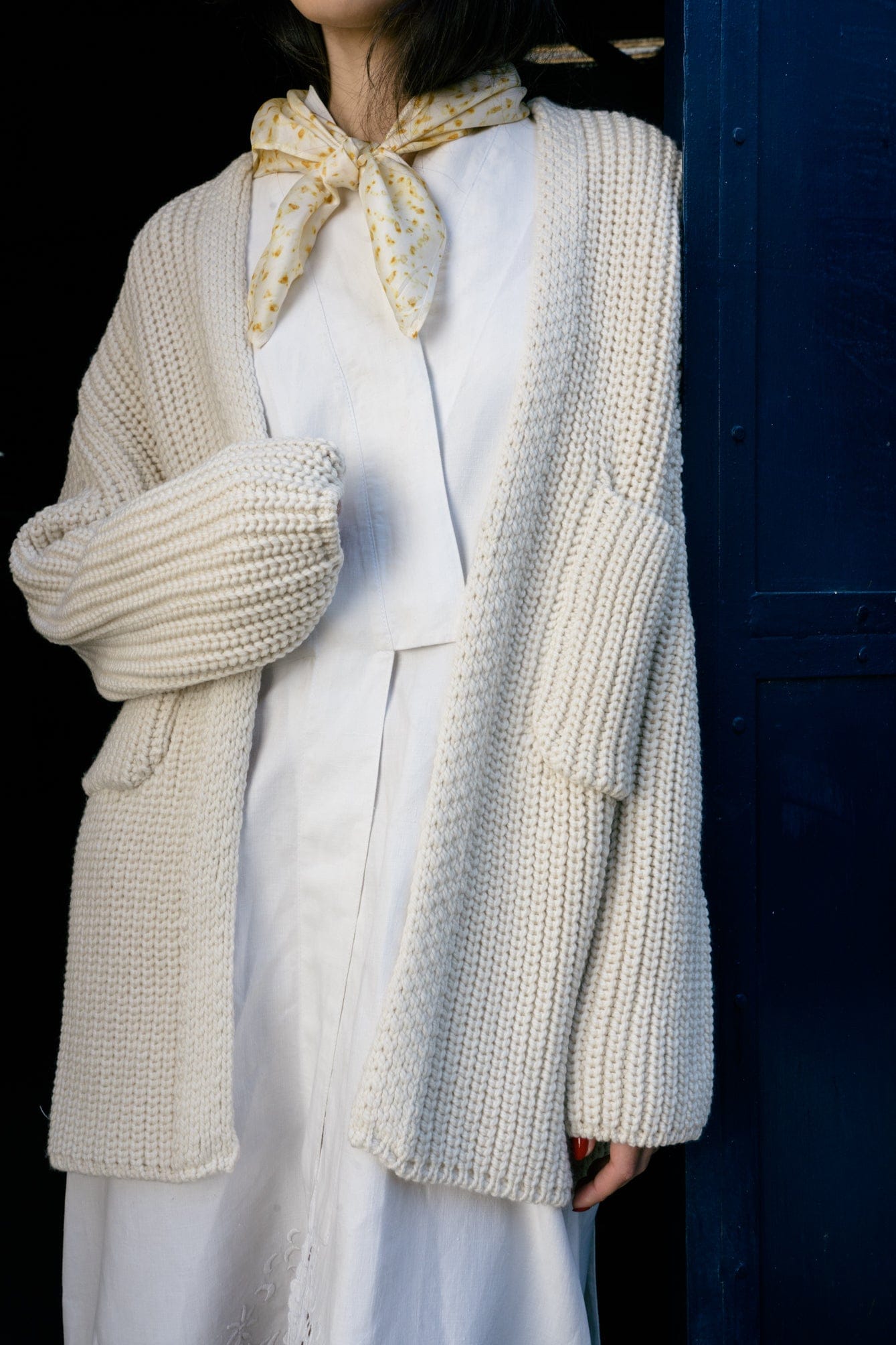 Cedro Cardigan in soft ivory — hand-knitted merino wool.