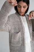 Cedro Cardigan in soft stone grey — hand-knitted merino wool.