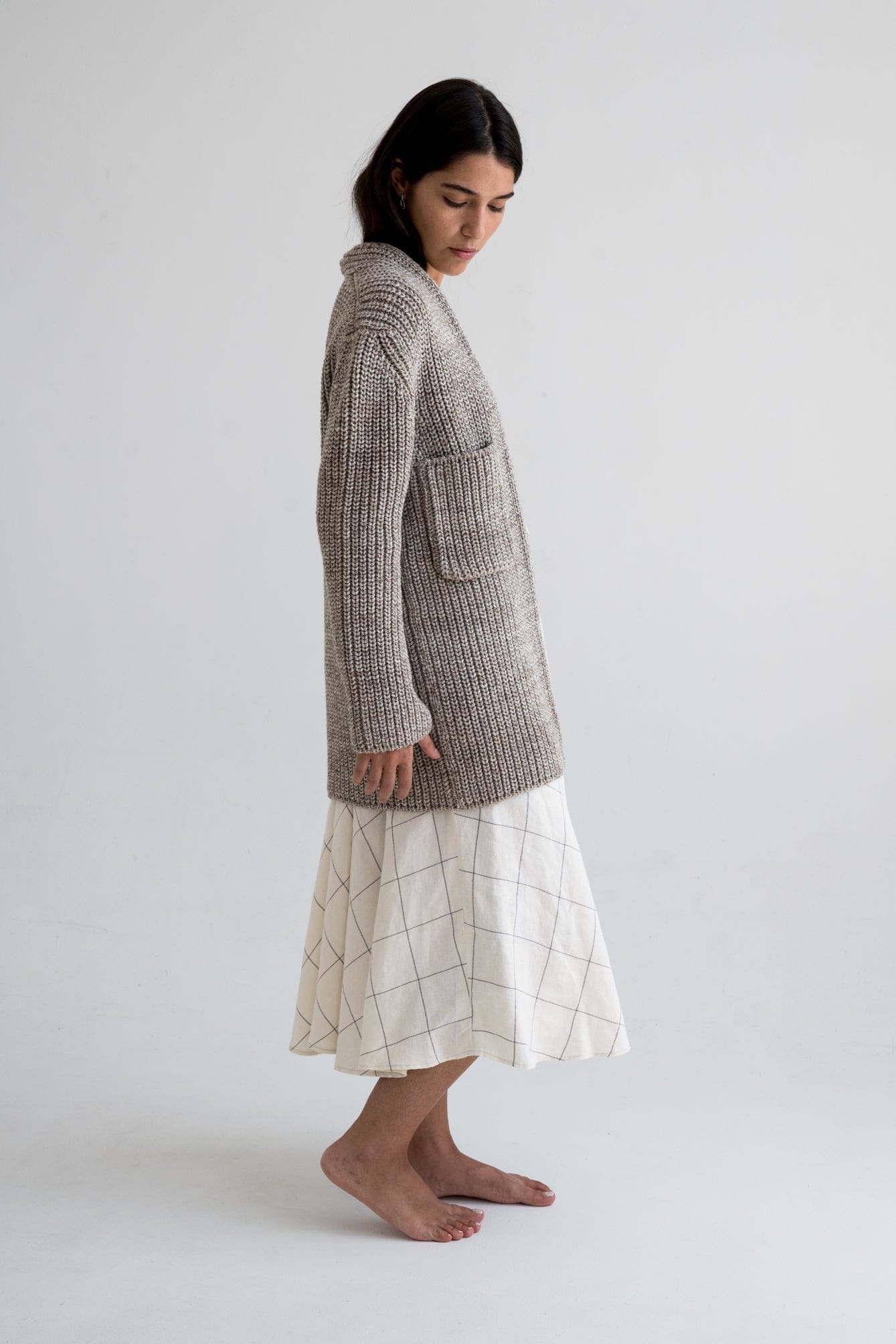 Cedro Cardigan detail — hand-knitted merino wool texture up close.