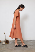 Flared Dress in soft yellow — hand-dyed silk.