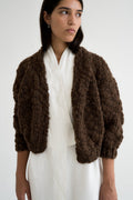 Jacaranda Cardigan in earth brown — hand-knitted wool.