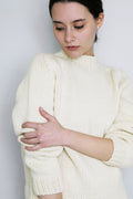 Molle Jumper in soft ivory — hand-knitted merino wool.
