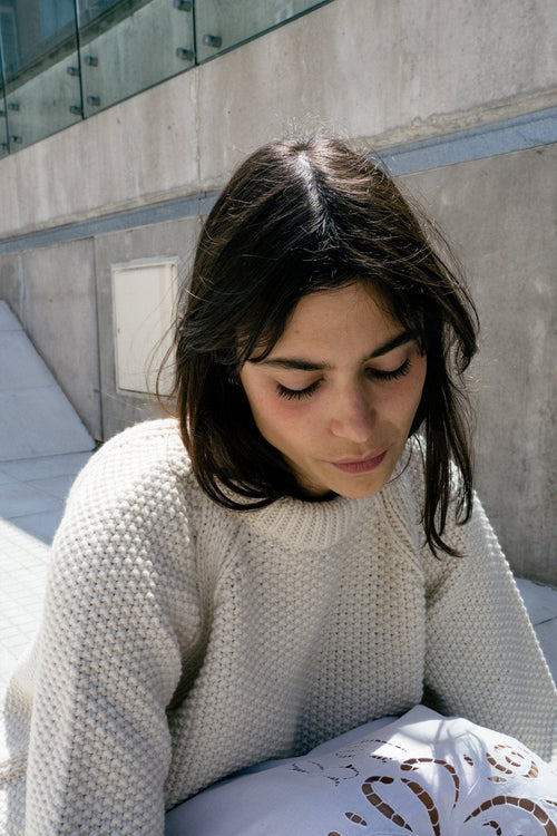 Naca Jumper detail — hand-knitted merino wool texture up close.