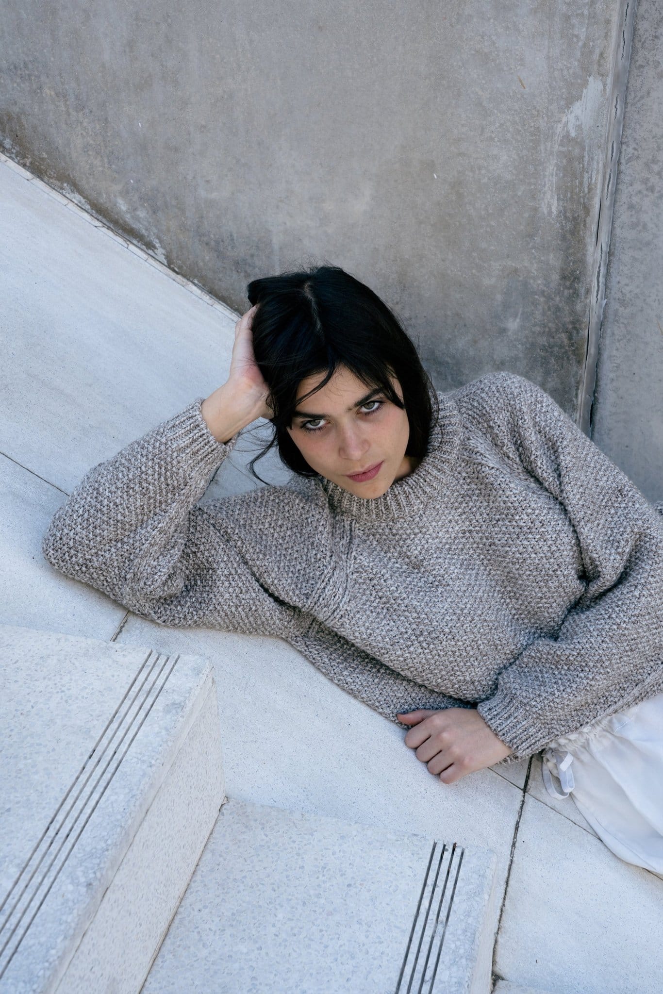 Naca Jumper detail — hand-knitted merino wool texture up close.