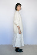 Roble Jumper in soft ivory — hand-knitted merino wool.