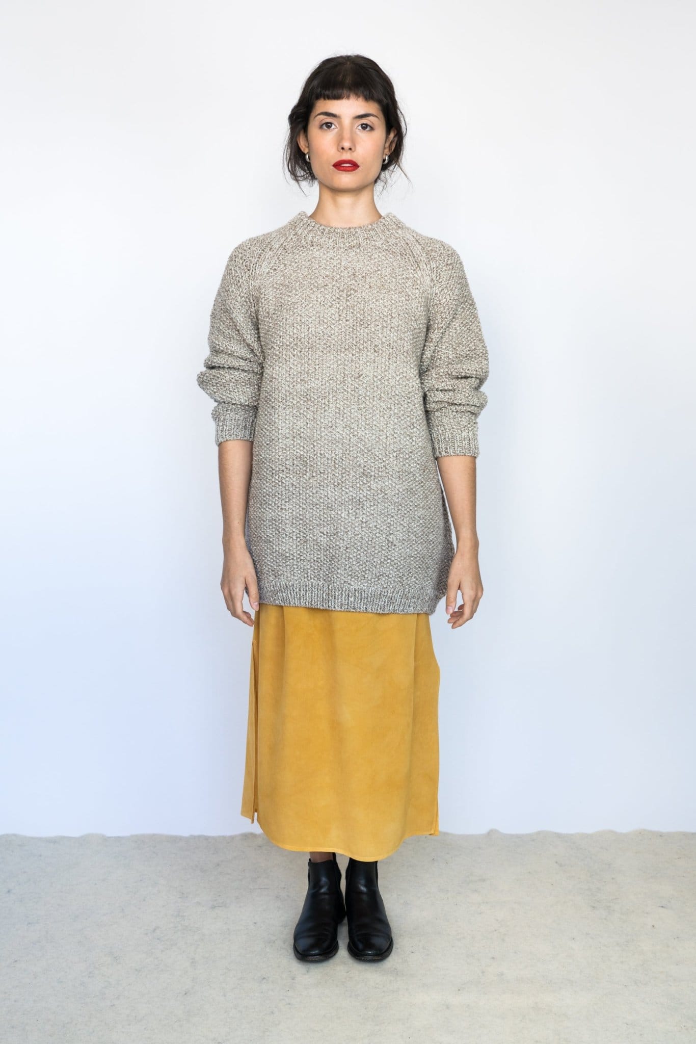 Roble Jumper detail — hand-knitted merino wool texture up close.