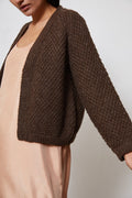 Sauco Cardigan in earth brown — hand-knitted wool.