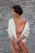 Sauco Cardigan in soft ivory — hand-knitted merino wool.