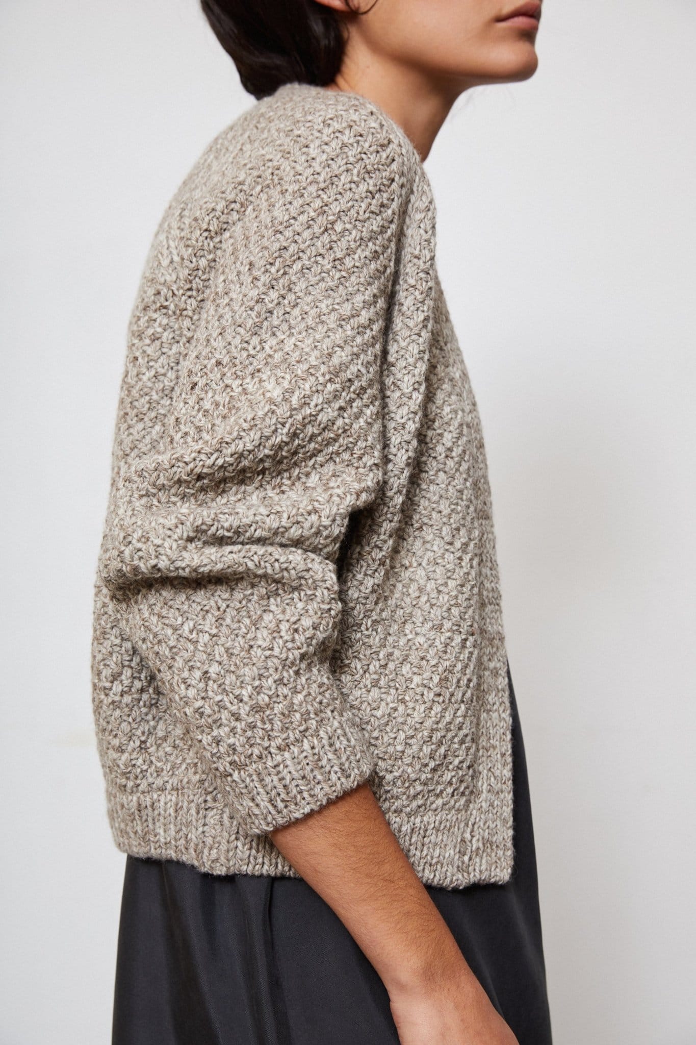 Sauco Cardigan detail — hand-knitted merino wool texture up close.