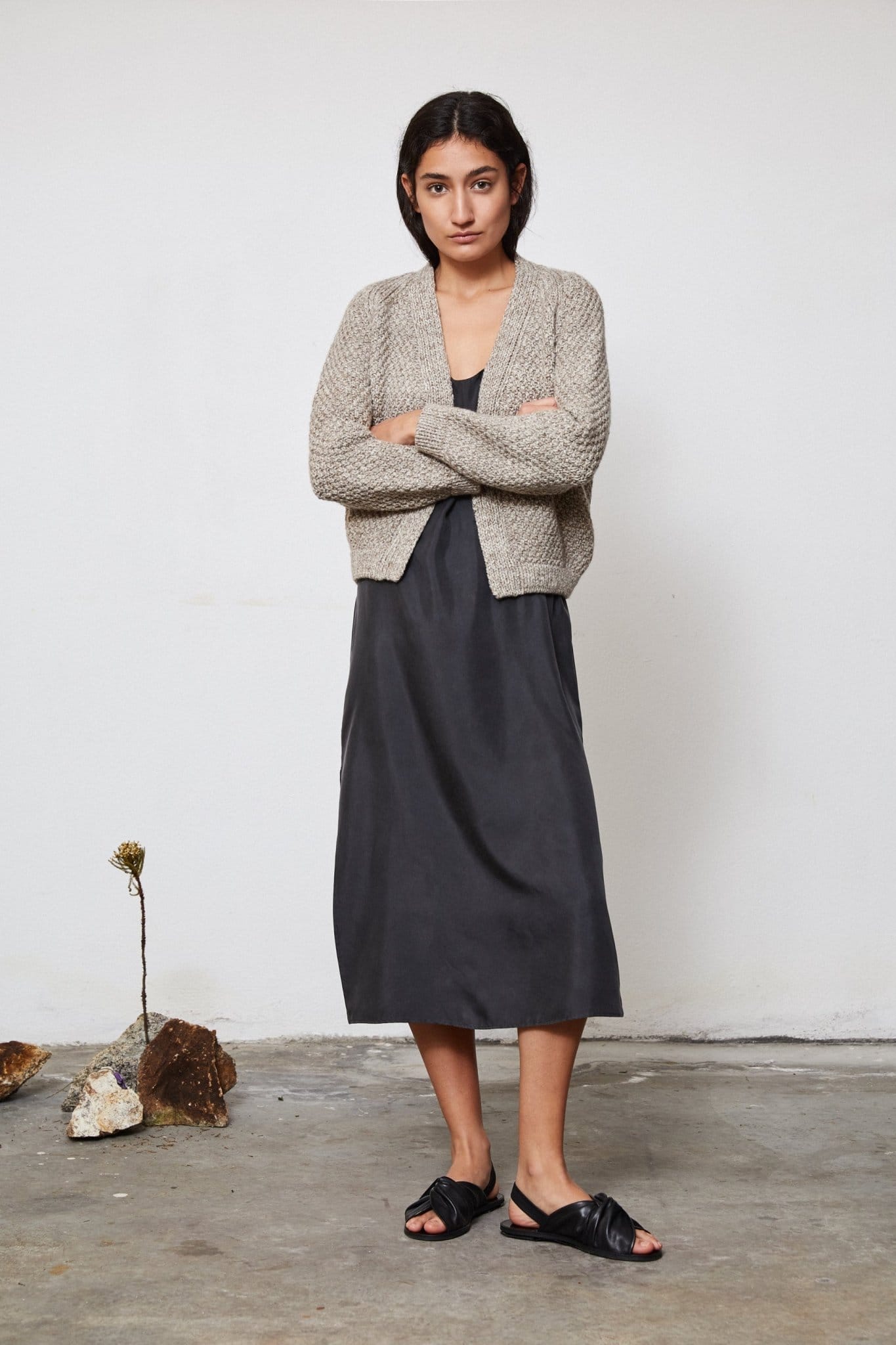Sauco Cardigan full view — hand-knitted merino wool, styled on figure.