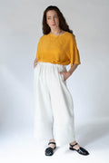 T Top in warm amber — hand-dyed silk.