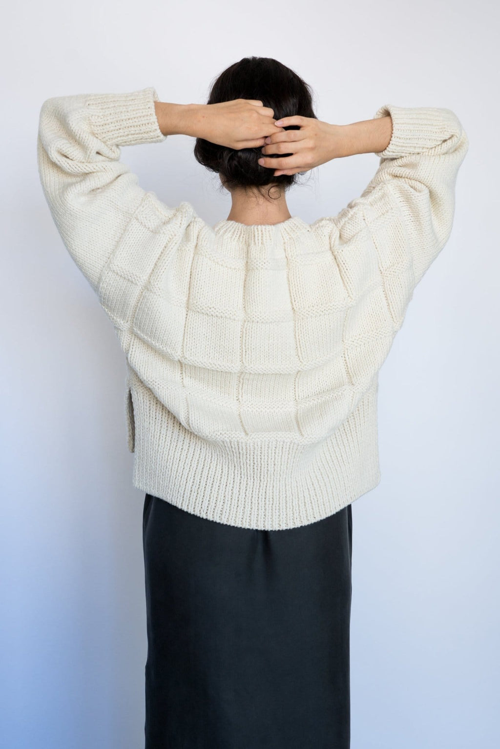 Tala Jumper in soft ivory — hand-knitted merino wool.