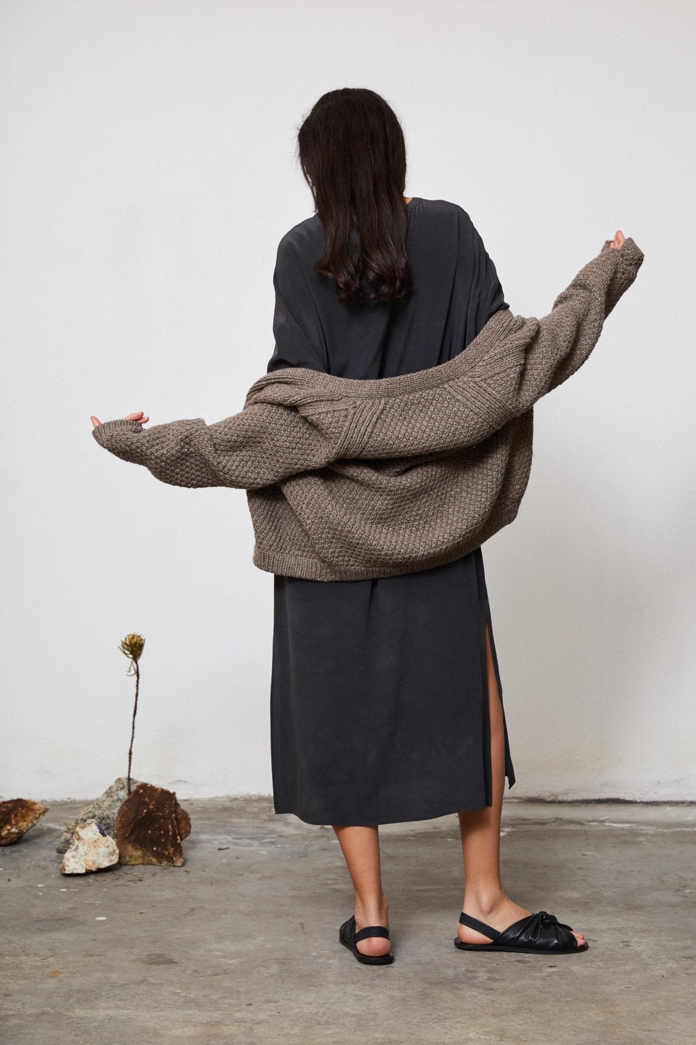 Sauco Cardigan detail — hand-knitted merino wool texture up close.