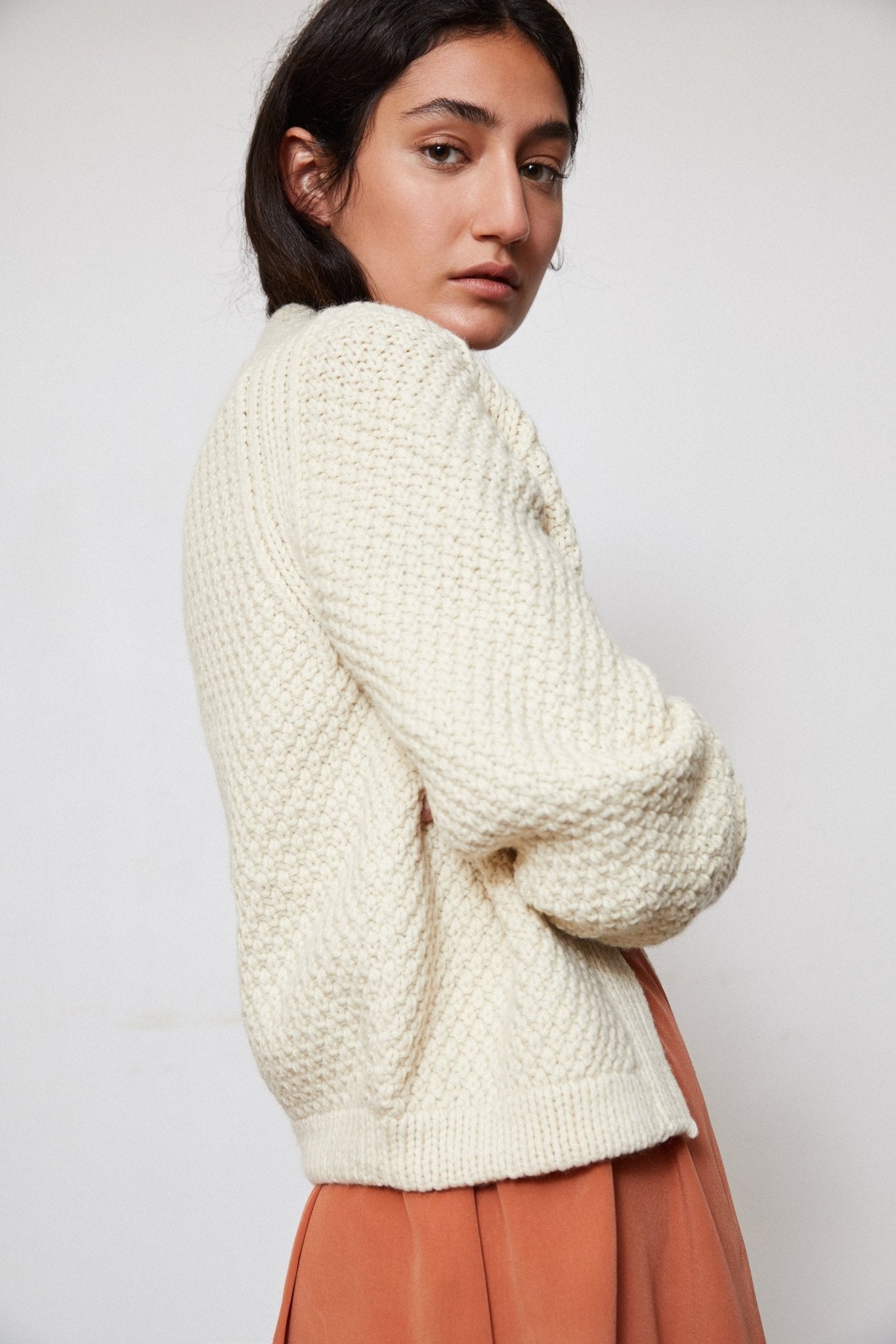 Sauco Cardigan detail — hand-knitted merino wool texture up close.