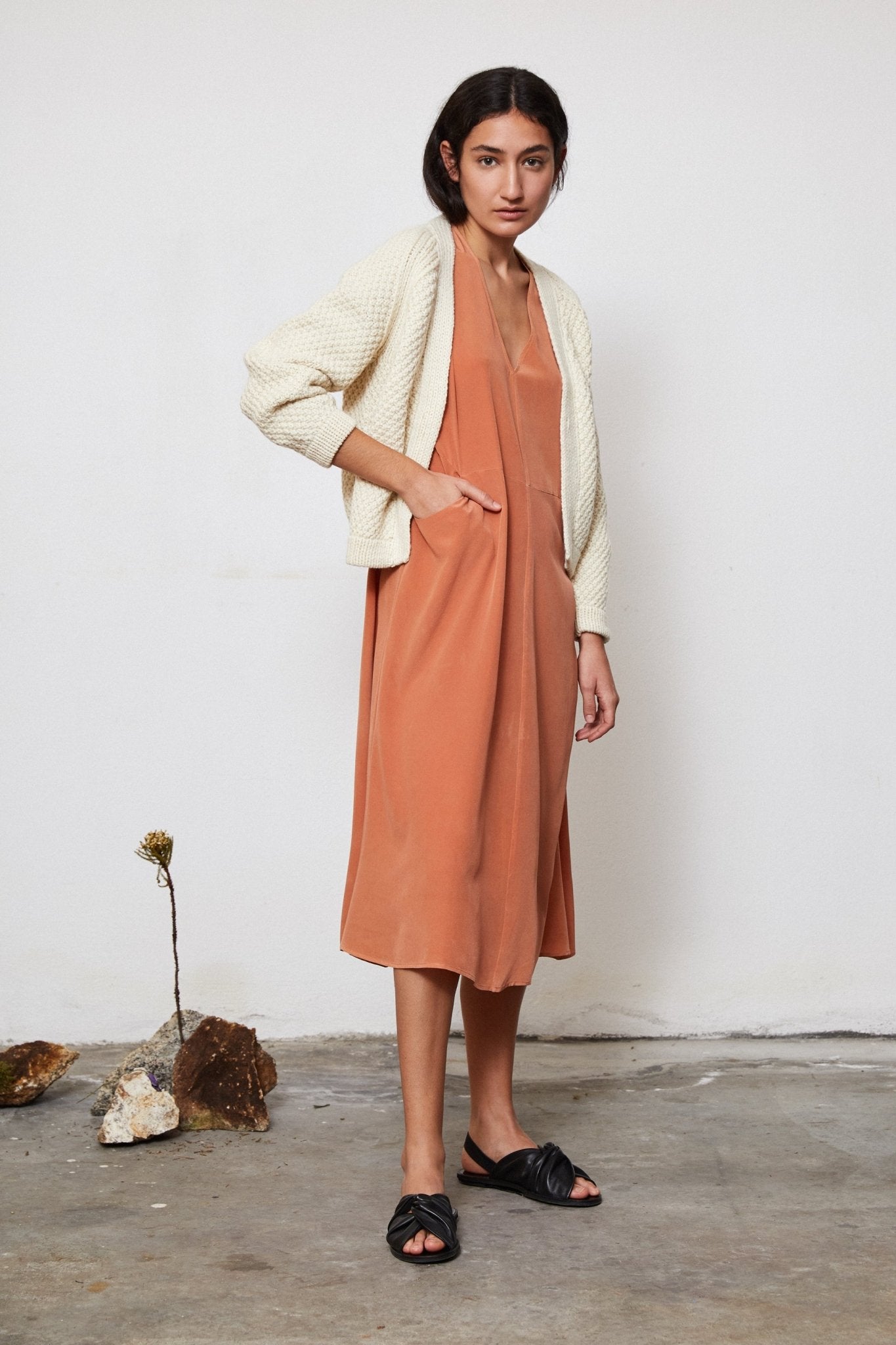 Sauco Cardigan full view — hand-knitted merino wool, styled on figure.